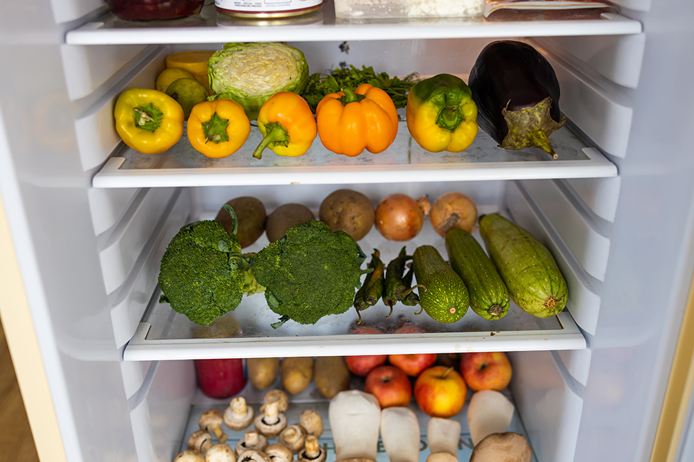 Fridge filled with fresh vegetable produce